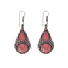 Handcrafted teardrop earrings with red inlay and intricate silver detailing