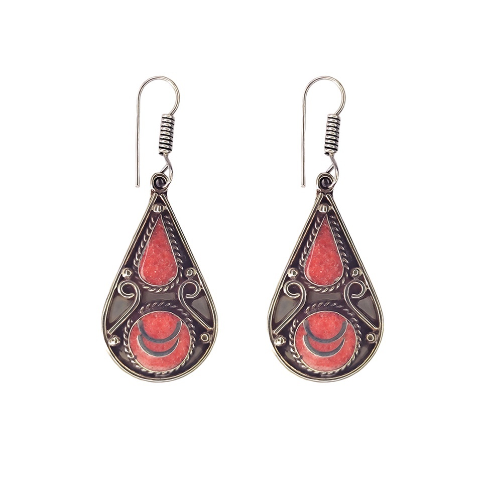 Handcrafted teardrop earrings with red inlay and intricate silver detailing