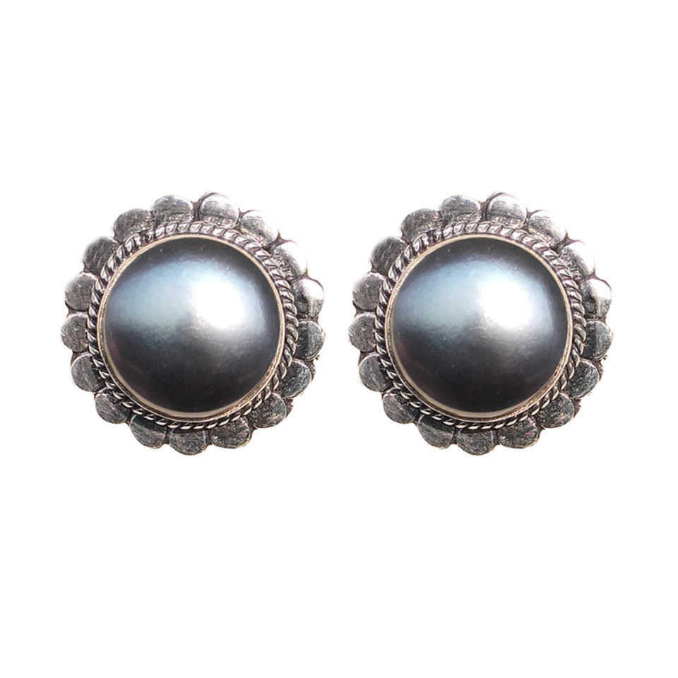Black pearl stud earrings with decorative silver floral border