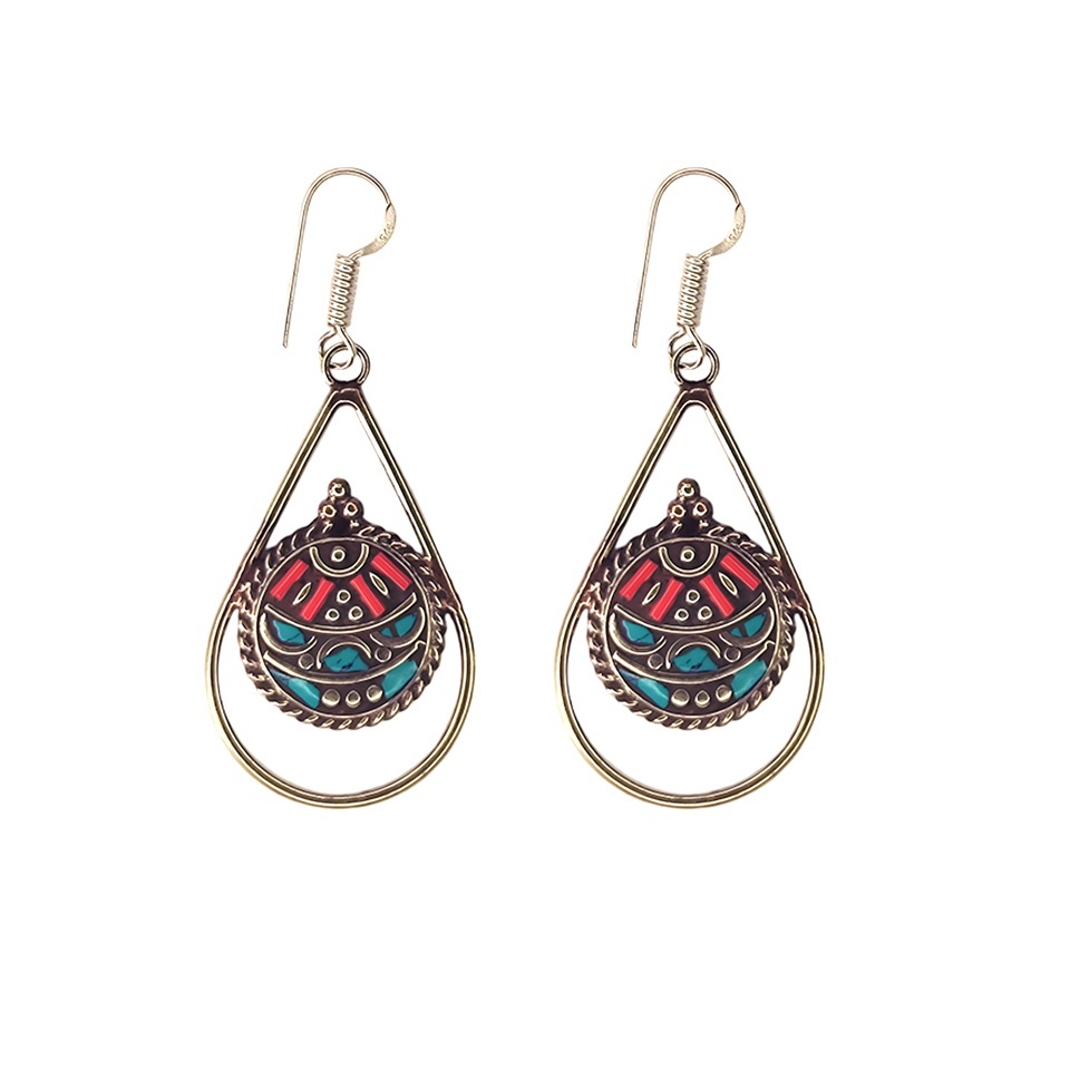 Handmade teardrop dangle earrings with red coral and turquoise inlay in intricate tribal design