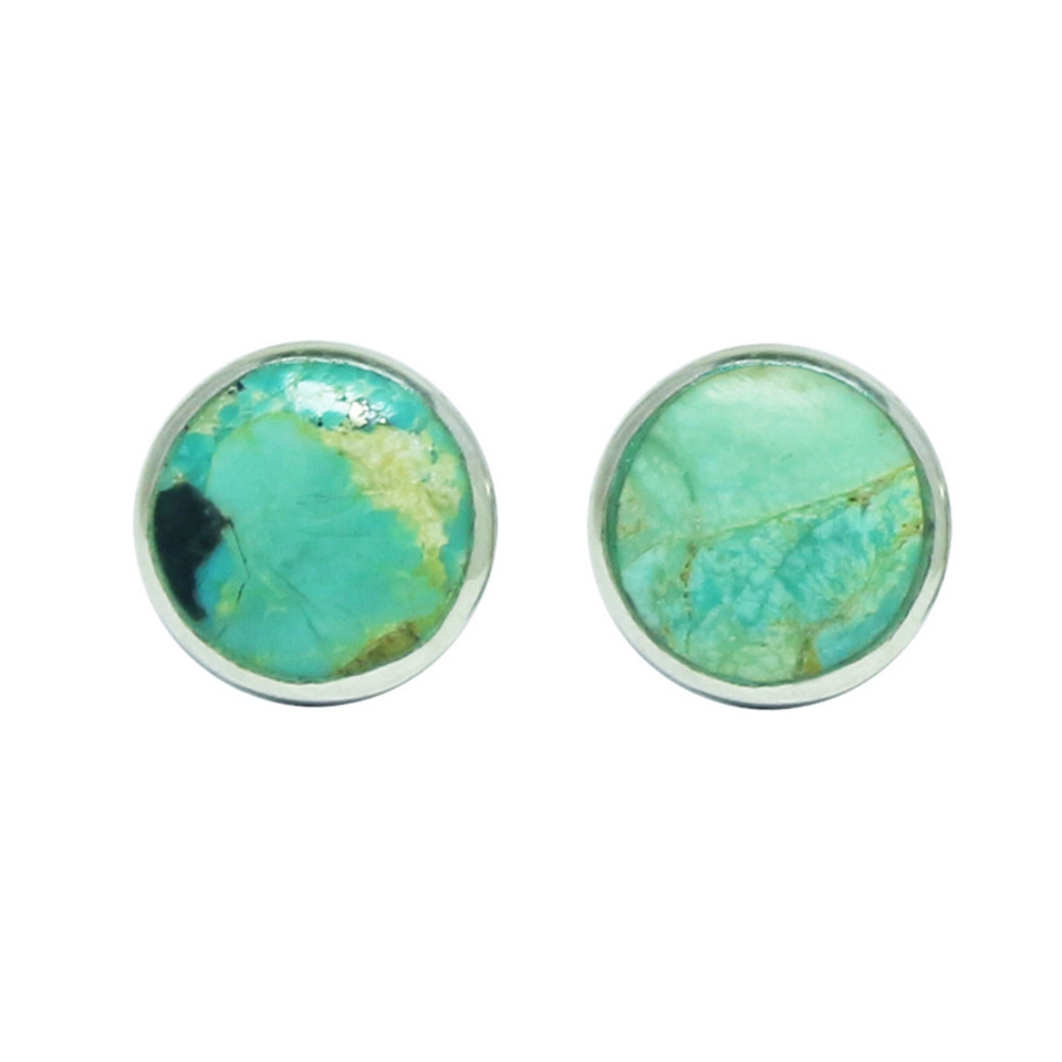 Round turquoise stud earrings in silver setting