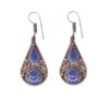 Handcrafted teardrop earrings with blue inlay and intricate silver detailing