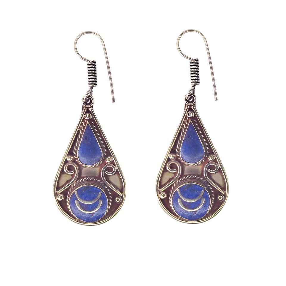 Handcrafted teardrop earrings with blue inlay and intricate silver detailing