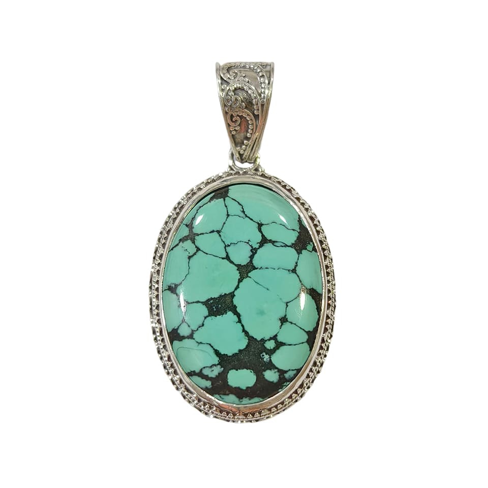 Handmade oval turquoise pendant with ornate silver frame