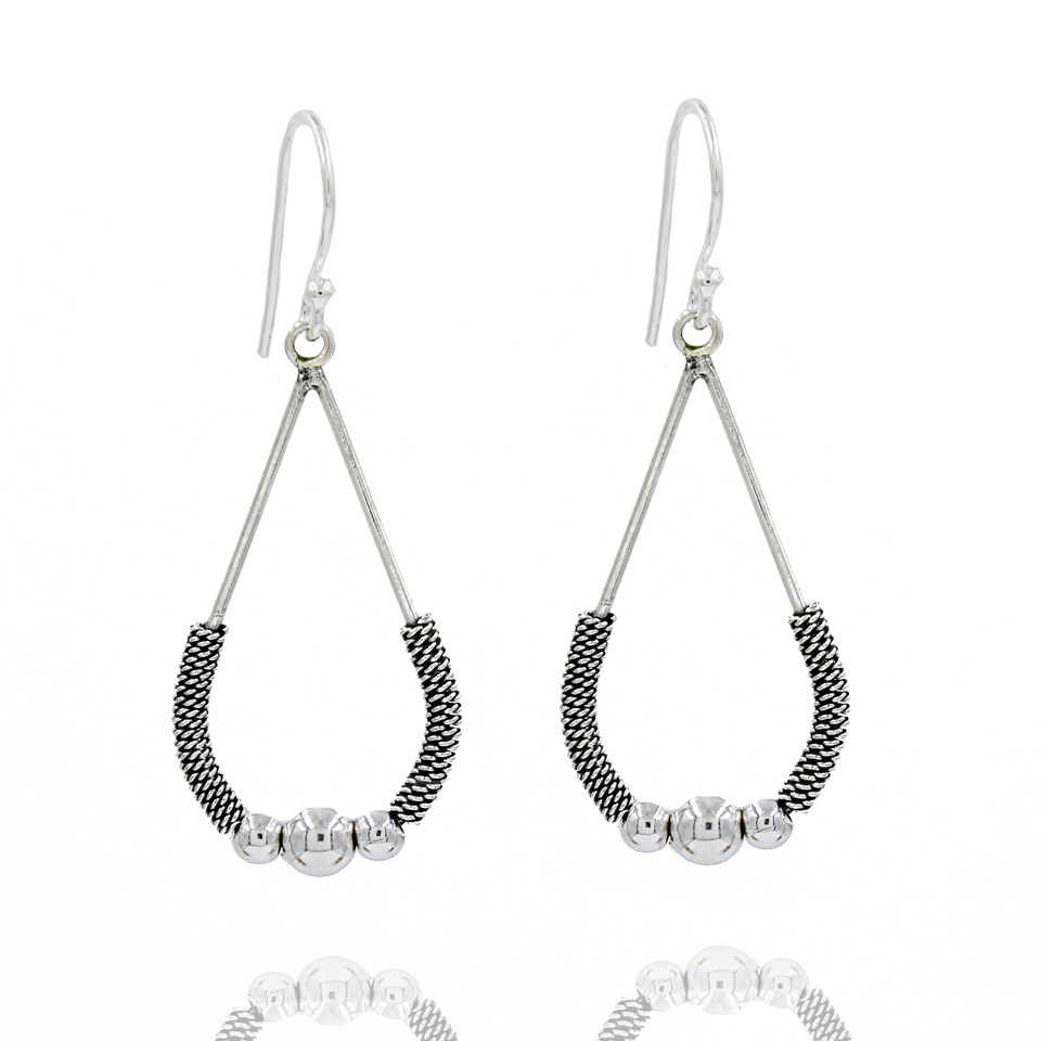 Oxidized silver tribal teardrop earrings with wire wrap and round beads