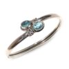 Sterling silver cuff bracelet with blue topaz gemstones
