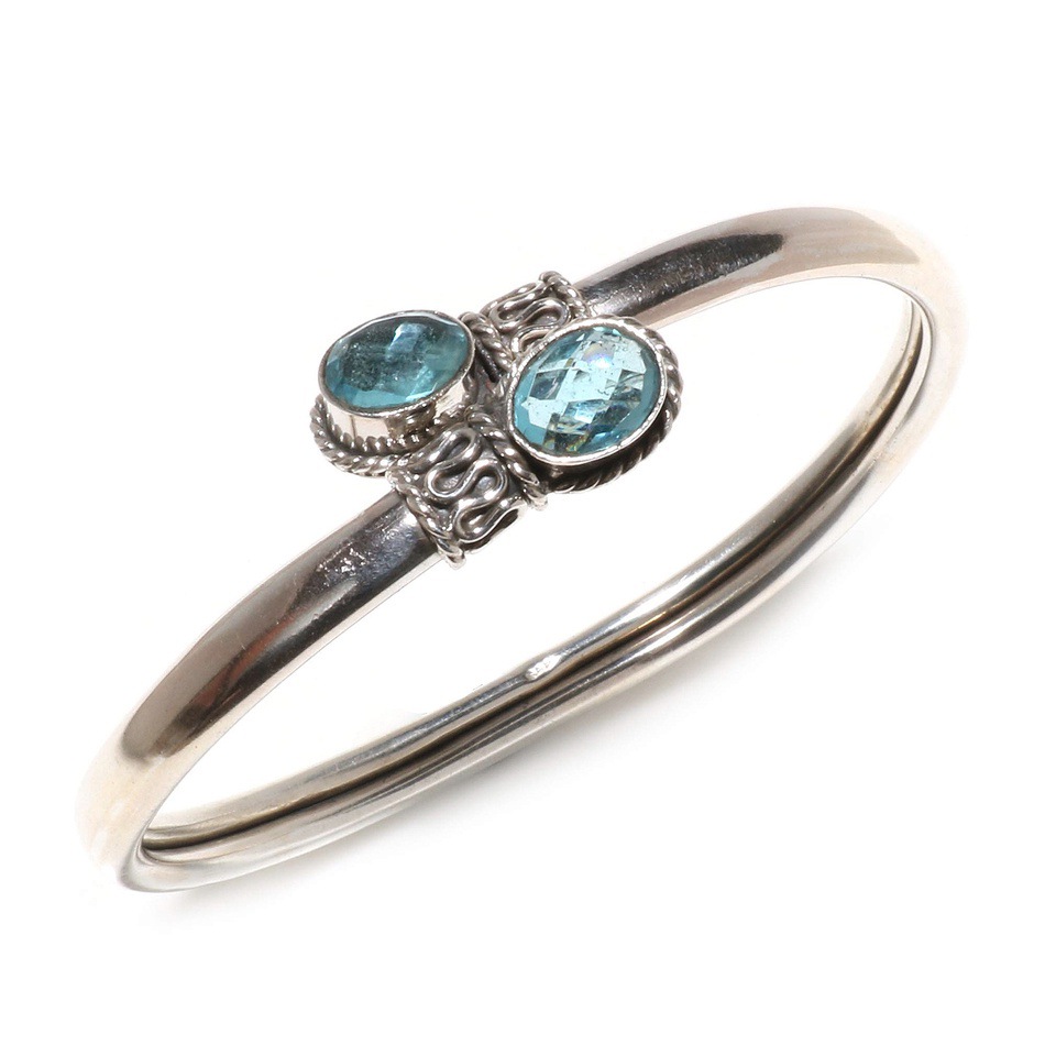 Sterling silver cuff bracelet with blue topaz gemstones