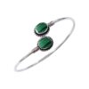Silver cuff bracelet with dual oval malachite gemstones