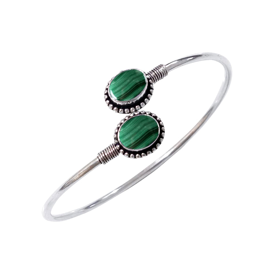 Silver cuff bracelet with dual oval malachite gemstones