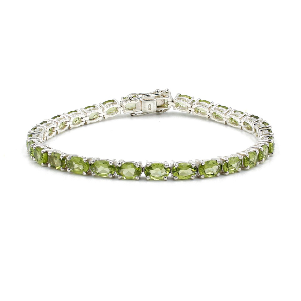 925 sterling silver tennis bracelet with oval-cut peridot gemstones