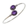 Silver cuff bracelet with dual oval faceted amethyst gemstones