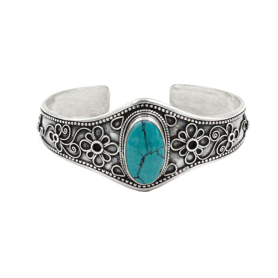 Sterling silver floral cuff with oval turquoise gemstone