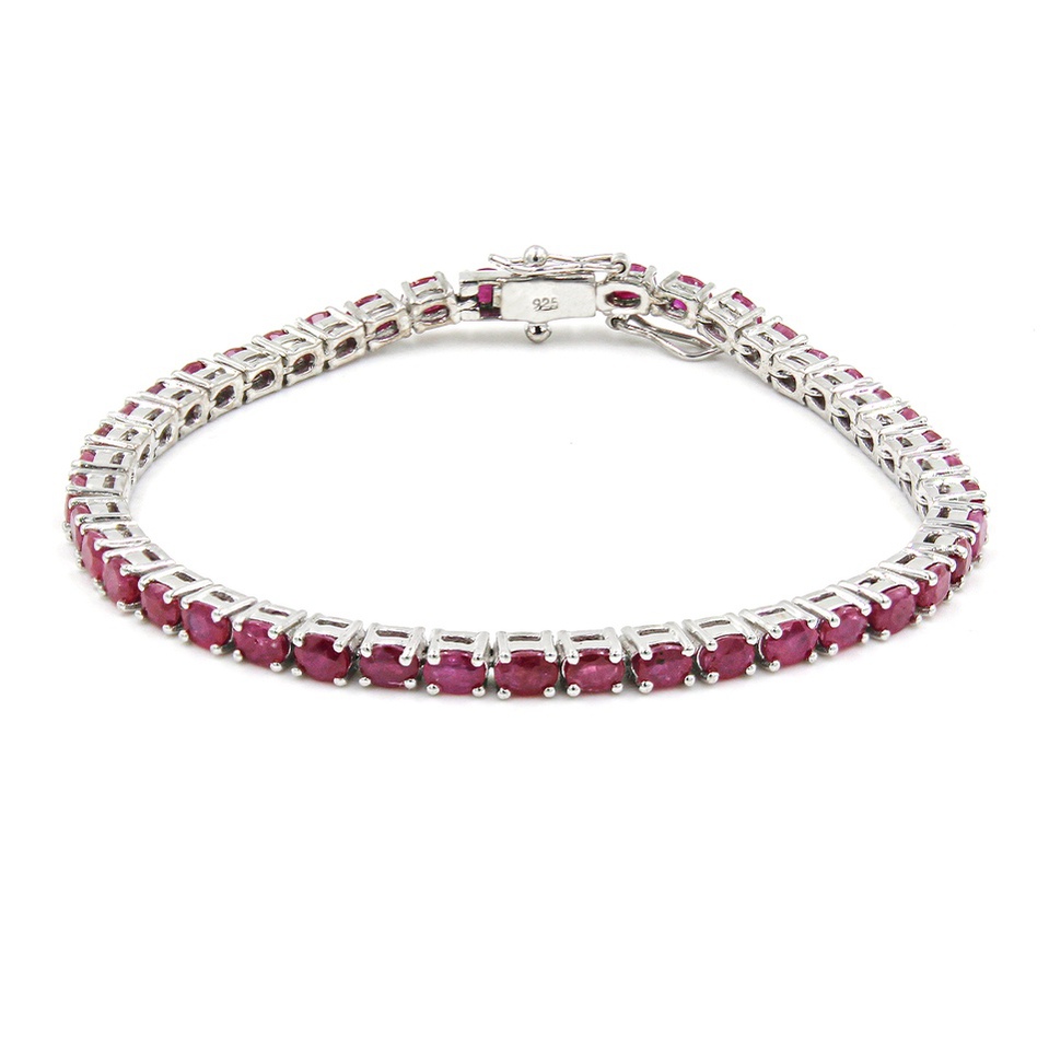 925 sterling silver tennis bracelet with oval-cut ruby gemstones
