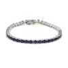 925 sterling silver tennis bracelet with oval-cut blue sapphire gemstones