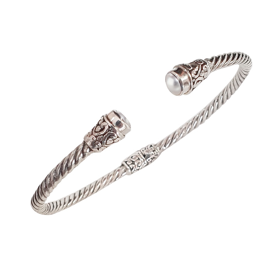 Sterling silver twisted cuff with pearl ends