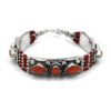 Handmade Tibetan silver bracelet with coral inlay