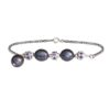 Black Pearl bracelet with amethyst-accented silver spacers.
