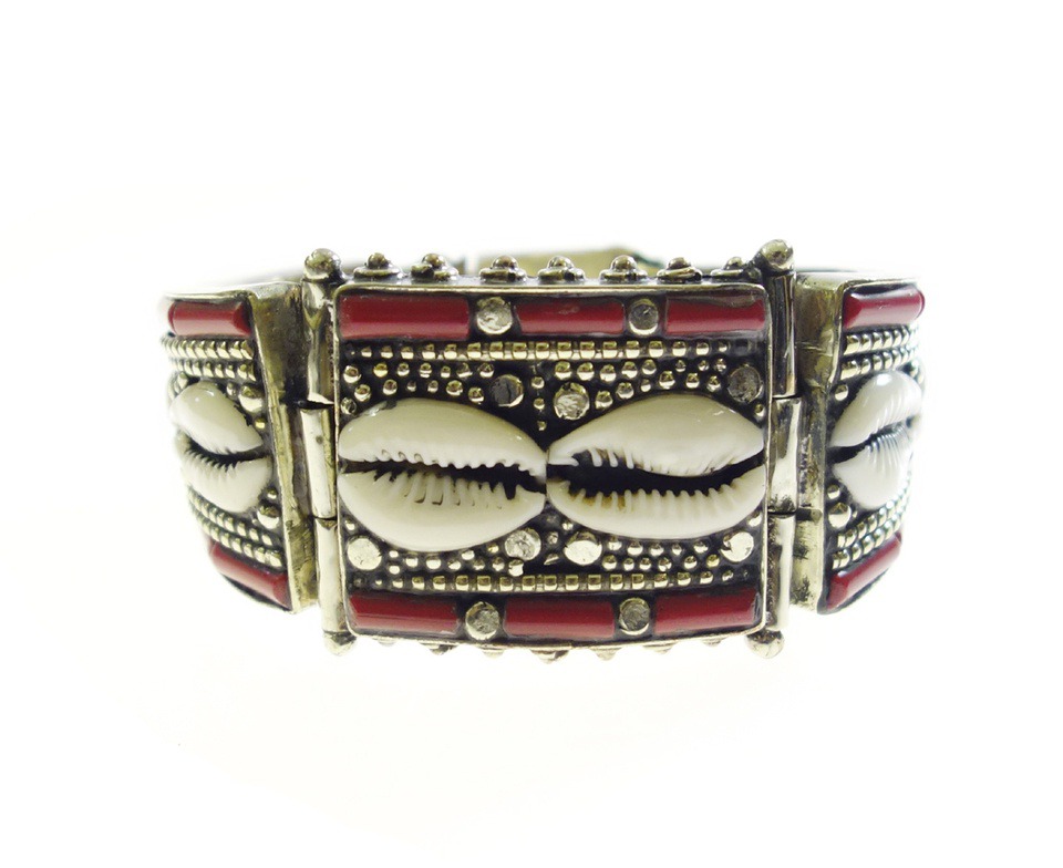 Tibetan silver bracelet with cowrie shell and red coral inlay