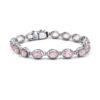 Sterling silver bracelet featuring faceted oval Rose Quartz gemstones