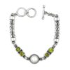 Peridot and pearl bracelet with patterned sterling silver bar links