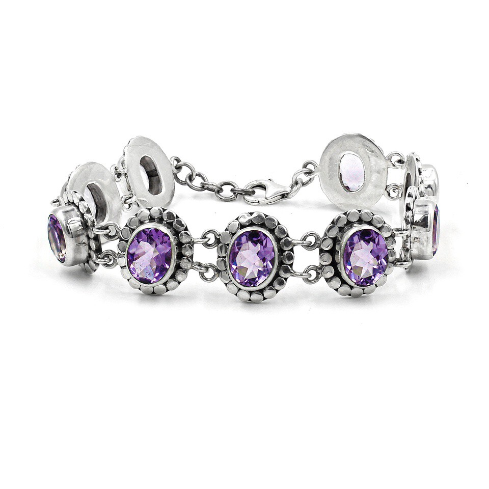 Amethyst bracelet with ornate sterling silver oval settings