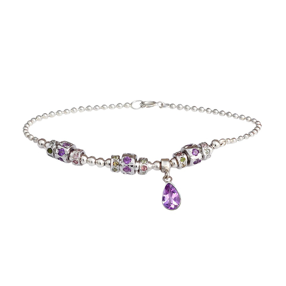 Silver beaded bracelet with purple gemstone spacers and teardrop charm