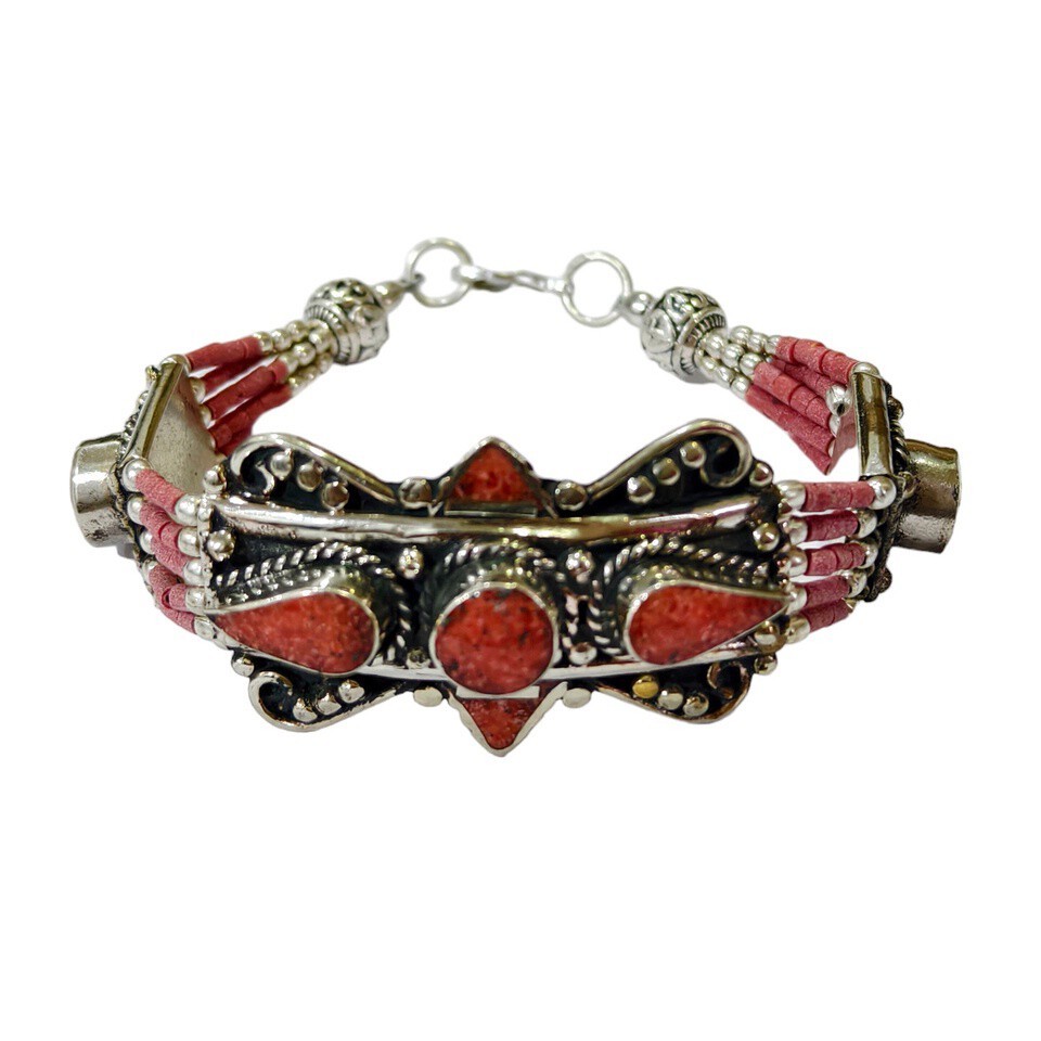 Antique silver bracelet with pink coral stones
