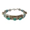 Handmade Tibetan silver bracelet with turquoise inlay.