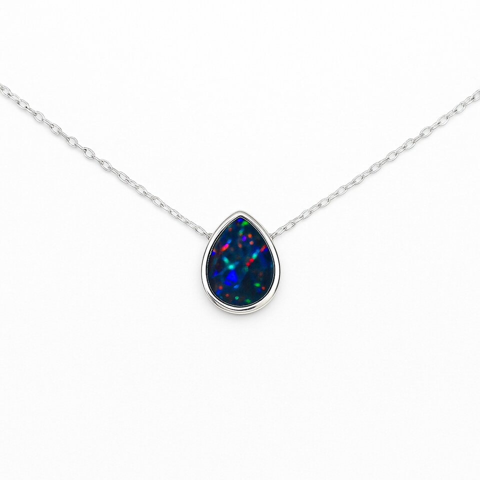 Teardrop black opal pendant on a delicate silver chain with vibrant multicolor flashes.