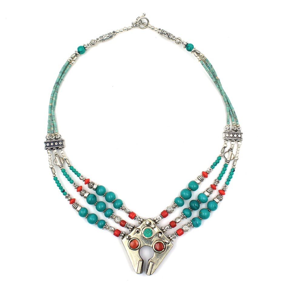 Tribal-style necklace with turquoise, coral and silver-tone detailing