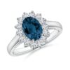 Sterling silver halo ring with Swiss Blue Topaz and white stones