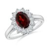 Sterling silver halo ring with Mozambique Garnet and white stones