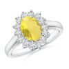 Sterling silver halo ring with Lemon Quartz and white stones