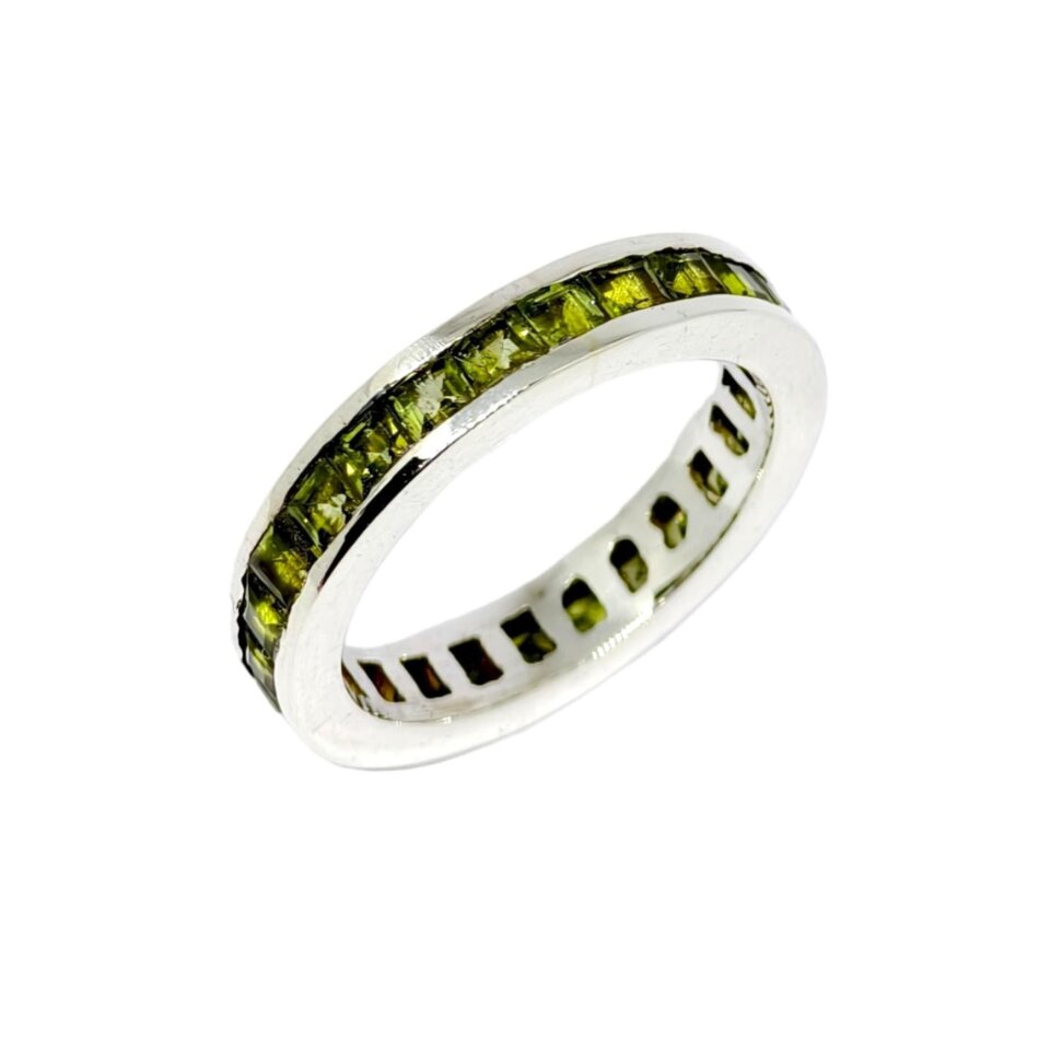 Sterling silver eternity ring with channel-set Peridot gemstones
