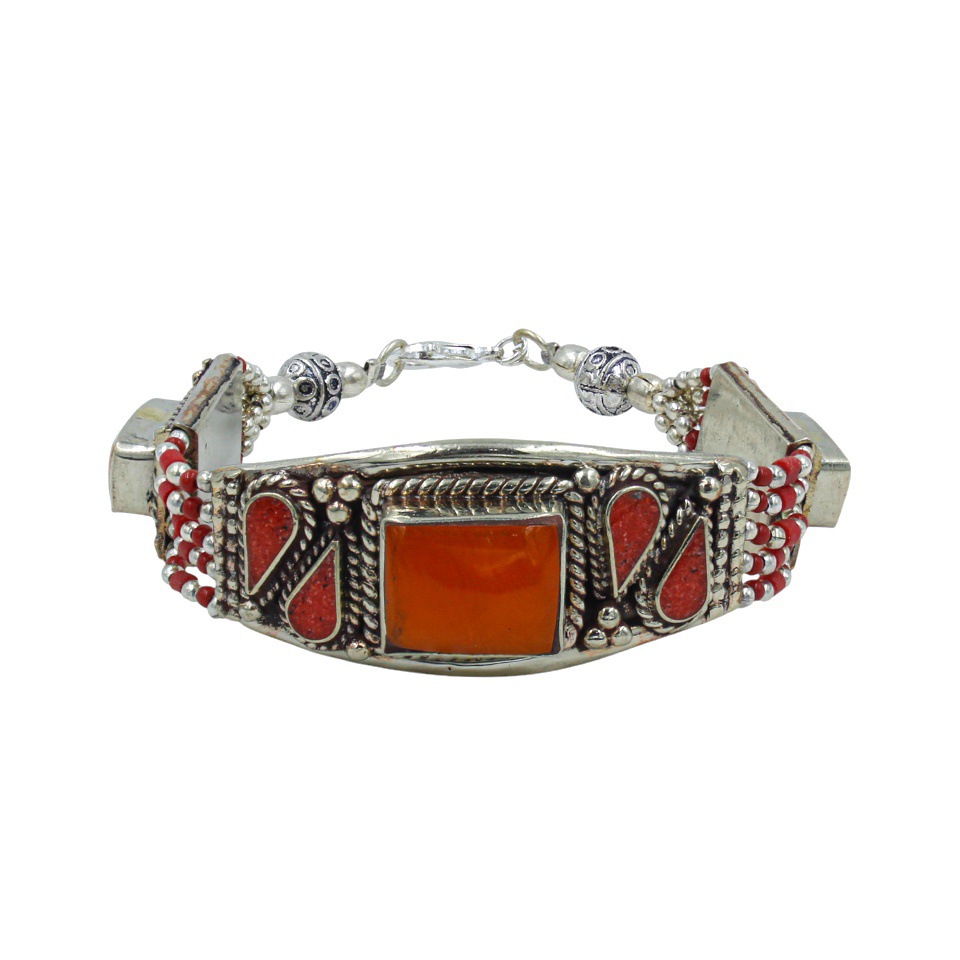 Orange resin and coral inlay tribal bracelet