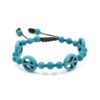 Turquoise beaded bracelet with peace sign charms and adjustable cord