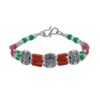 Red, green, and silver beaded bracelet with ornate silver accents
