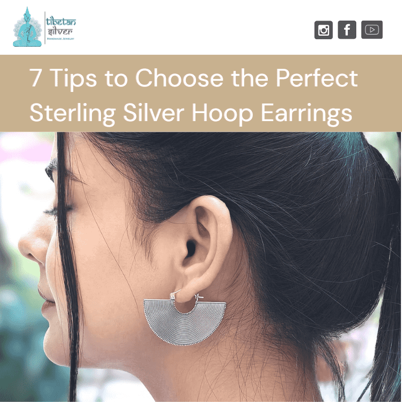 Woman wearing stylish sterling silver hoop earrings