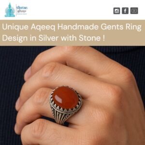 Aqeeq handmade gents ring design in silver with stone worn on a man's hand.