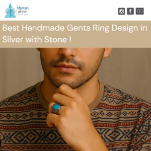 Man wearing a handmade gents ring design in silver with stone
