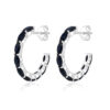 Silver hoop earrings with black onyx gemstones.
