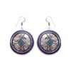 Round Tibetan earrings with turquoise inlay and silver floral design.