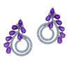 Silver spiral earrings with purple amethyst stones.