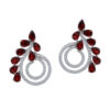 Silver spiral earrings with garnet gemstones.