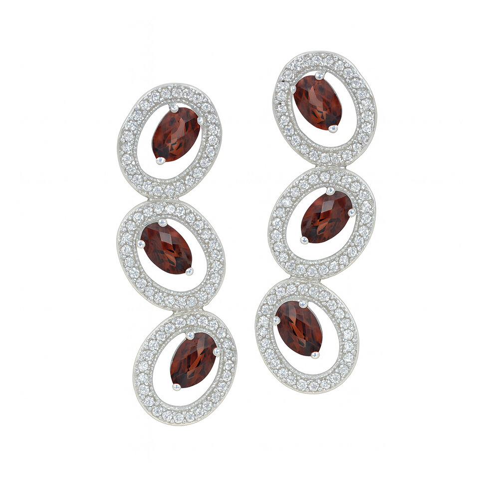 Silver oval drop earrings with garnet gemstones.
