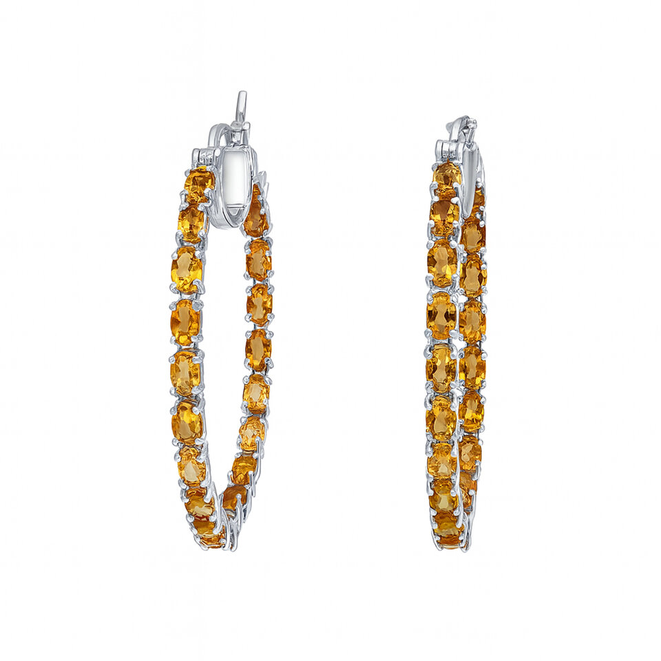 Silver hoop earrings with citrine gemstones.